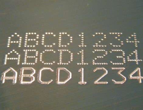 Dot pin marked characters in line and dotted styles on a steel plate