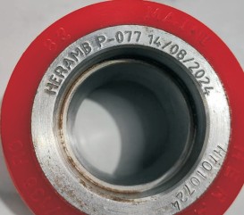Dot pin marked identification text on a machined bearing ring